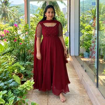 ELEGANT MAROON GEORGETTE GOWN WITH EMBROIDERY DETAILING